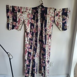 This beautiful Yukata with beautiful flowers and Geisha. Made in Japan